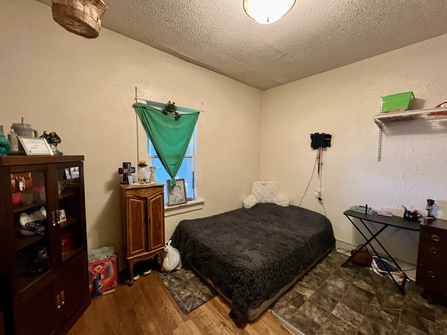 514 West Harrison Street Villa Grove, IL 61956 - Photo 11 of 21 a bedroom with furniture and a wooden floor