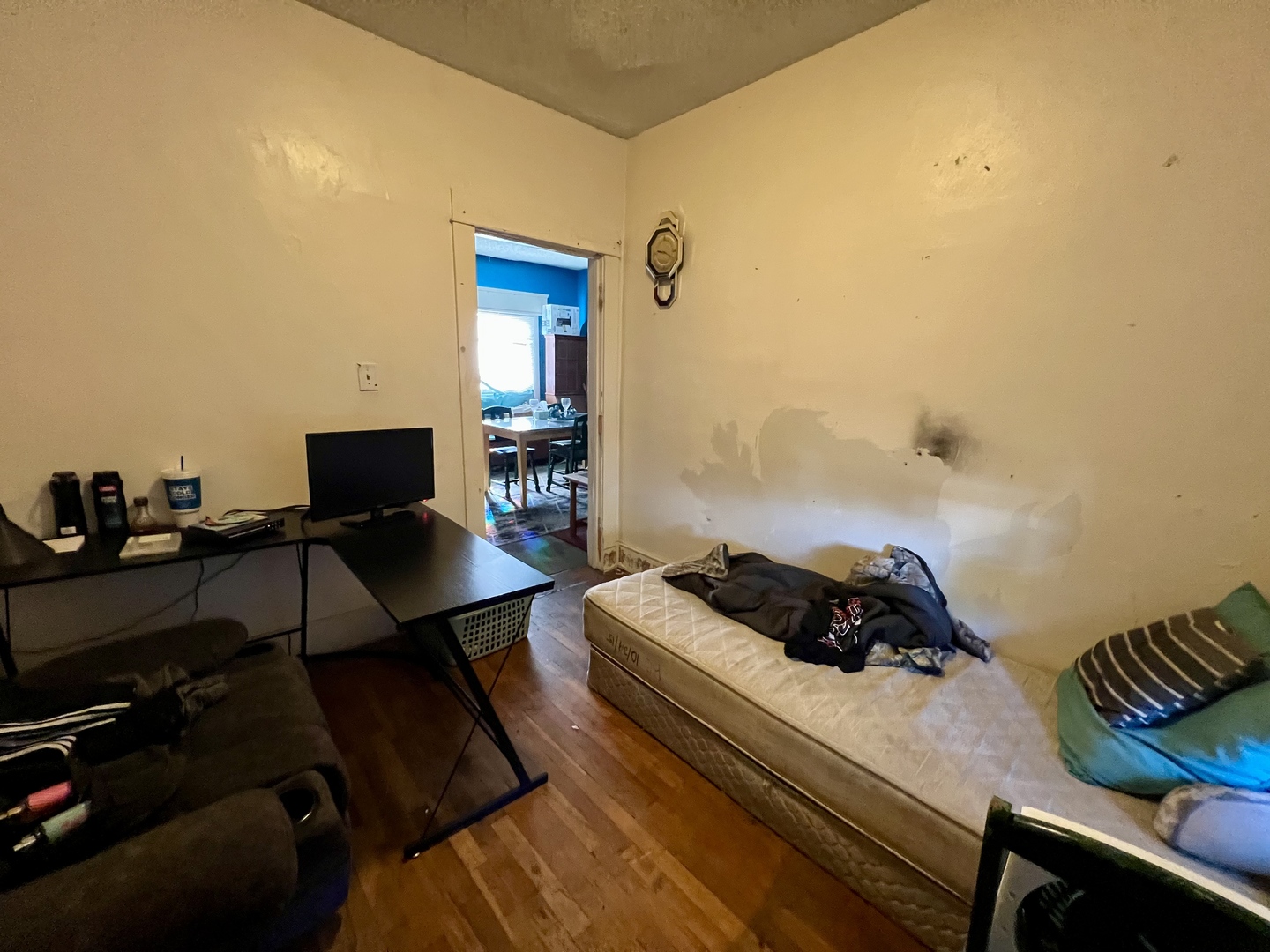 514 West Harrison Street Villa Grove, IL 61956 - Photo 17 of 21 a bedroom with a bed and a desk