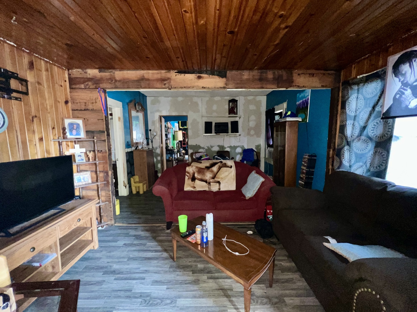 514 West Harrison Street Villa Grove, IL 61956 - Photo 4 of 21 a living room with furniture and a flat screen tv
