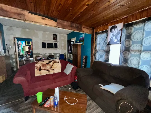 a living room with furniture and a couch