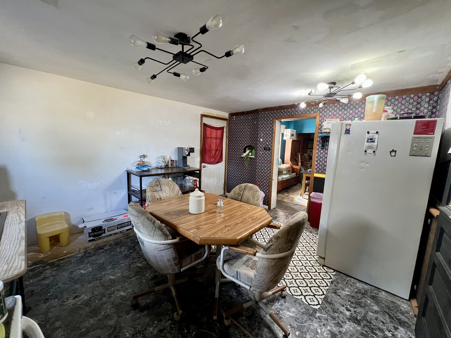 514 West Harrison Street Villa Grove, IL 61956 - Photo 8 of 21 a view of a dining room with furniture