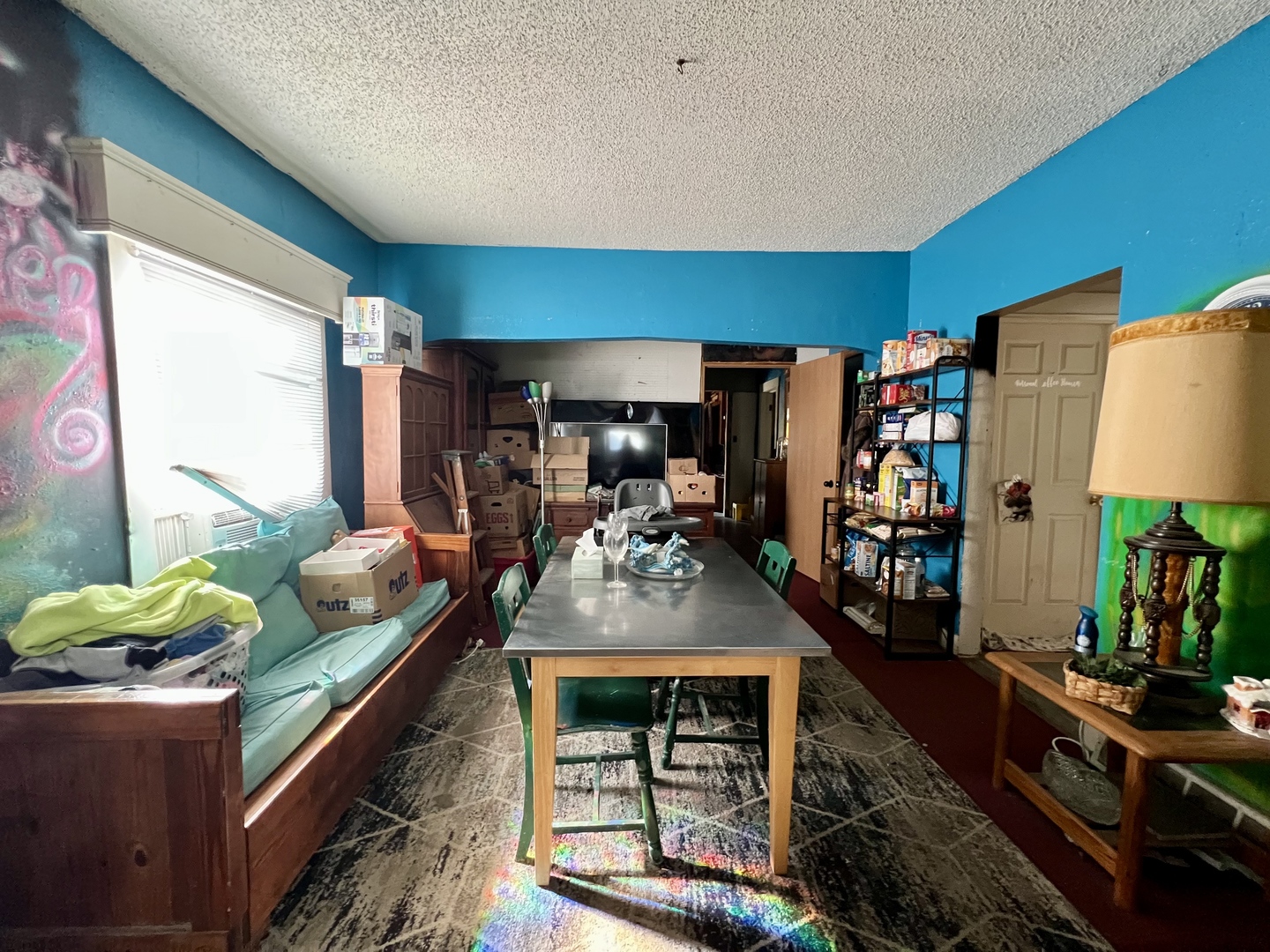 514 West Harrison Street Villa Grove, IL 61956 - Photo 9 of 21 a living room with furniture and a flat screen tv