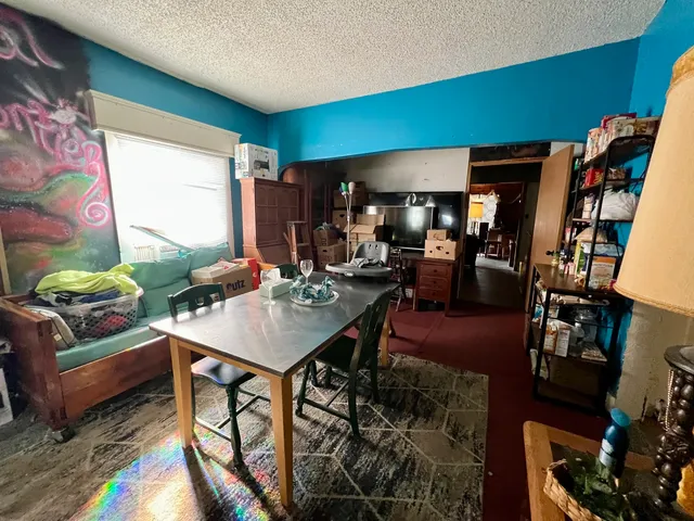 a view of a livingroom with furniture and window