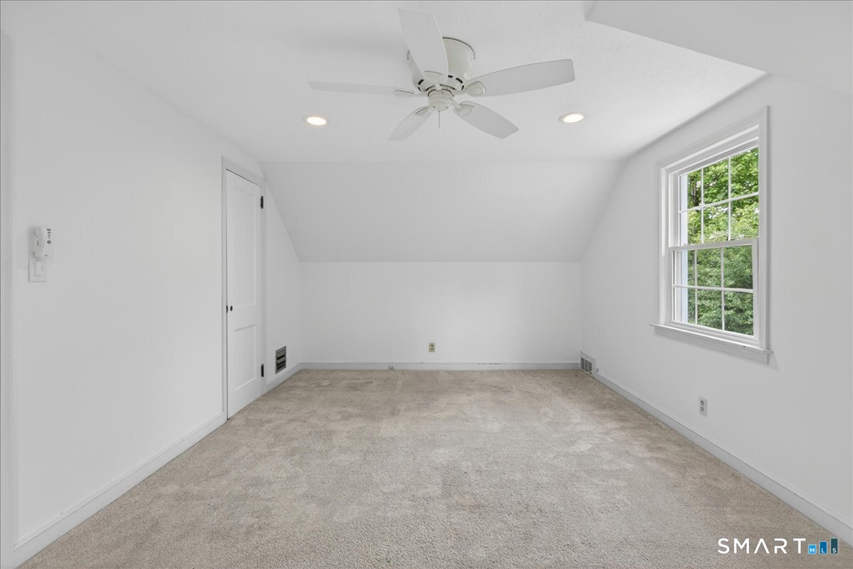 1006 King Road Cheshire, CT 06410 - Photo 21 of 40 This Bedroom also has hardwood flooring under the carpet, recessed lights, ceiling fan and shared walk-in closet.