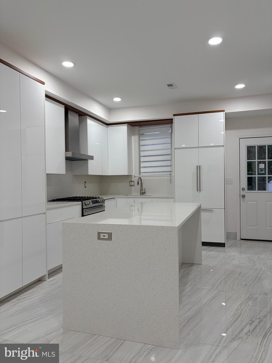 726 Roxboro Place Northwest Washington, DC 20011 - Photo 3 of 21 a kitchen with stainless steel appliances granite countertop a sink stove and cabinets
