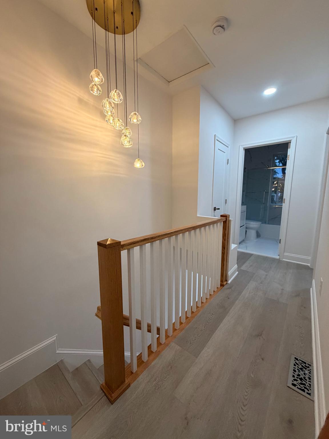 726 Roxboro Place Northwest Washington, DC 20011 - Photo 8 of 21 a view of a hallway with a chandelier