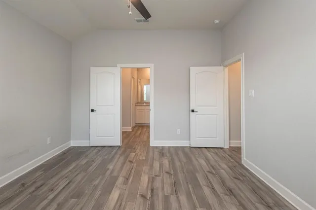 a kitchen with a sink stove and refrigerator