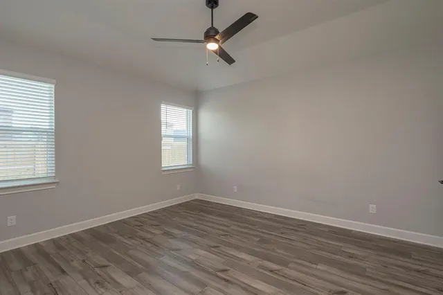 a kitchen with granite countertop stainless steel appliances and sink