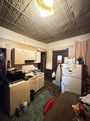 $80,000 | 5935 South Racine Avenue, Chicago, IL 60636