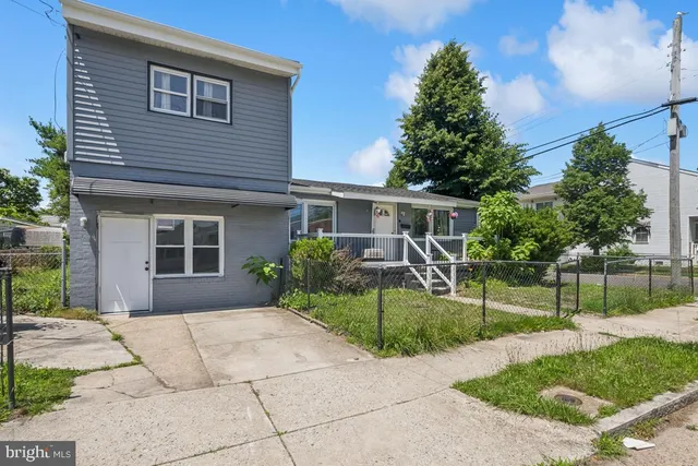 a view of a house with a patio