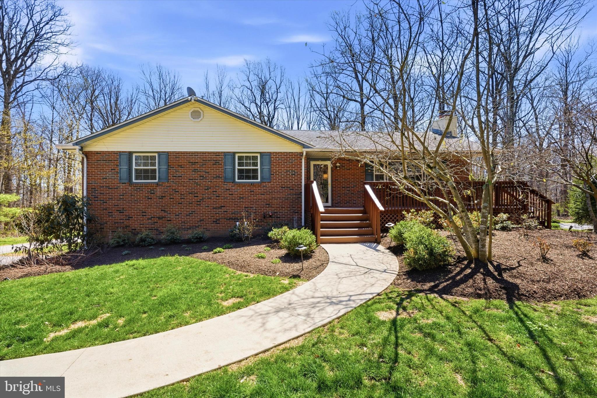 1052 West Valley Hill Road Malvern, PA 19355 - Photo 1 of 25 a front view of a house with garden
