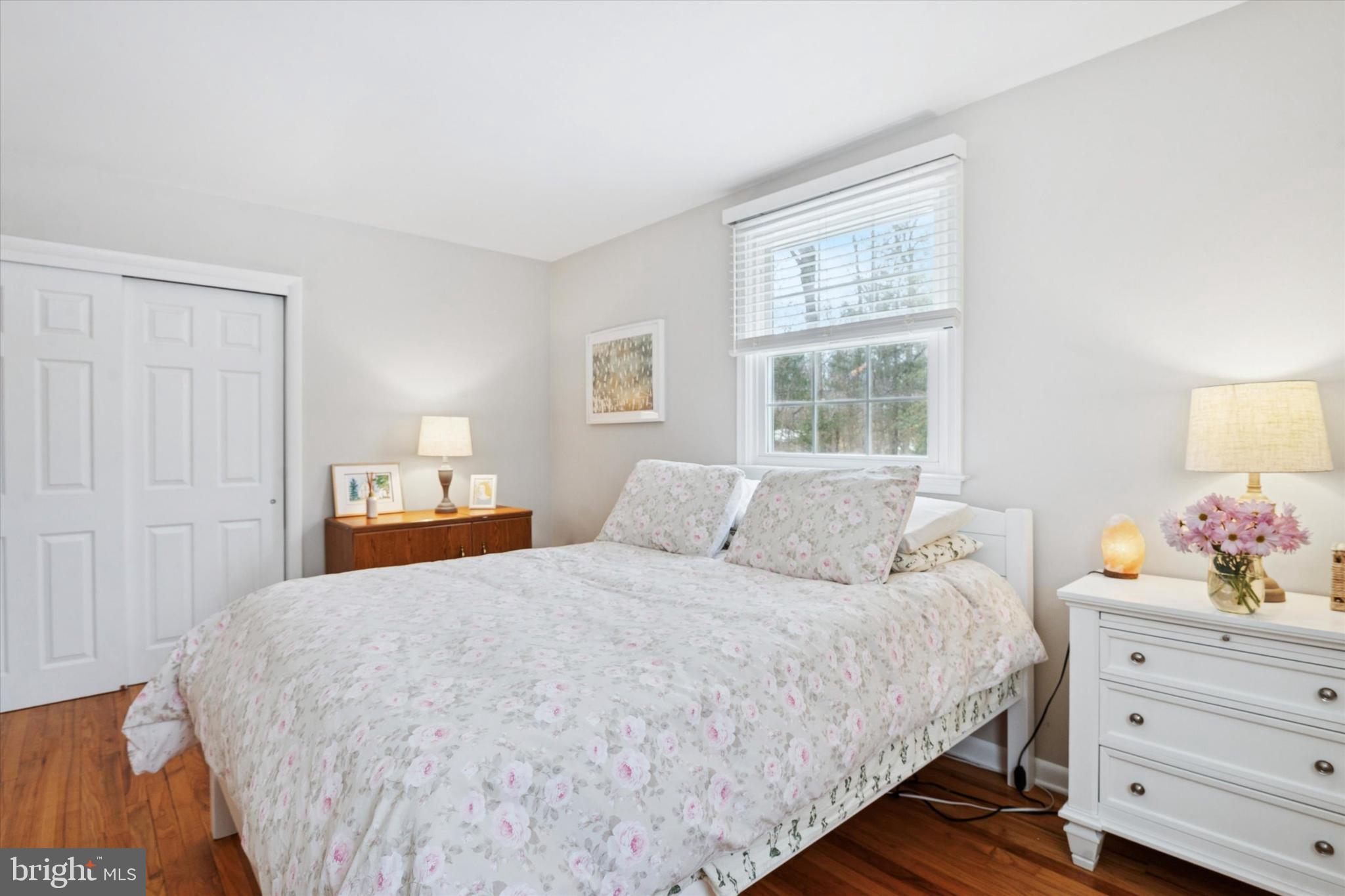 1052 West Valley Hill Road Malvern, PA 19355 - Photo 18 of 25 a bedroom with a bed and window