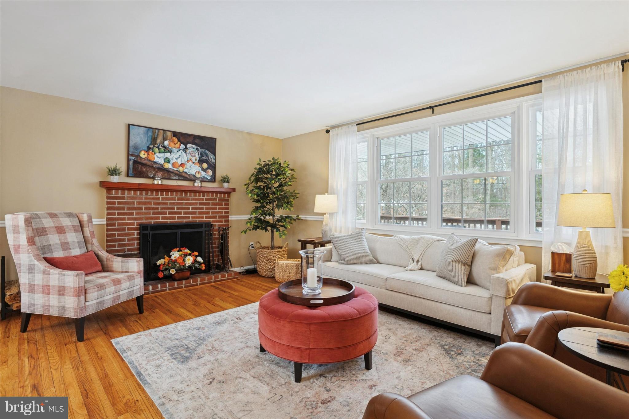 1052 West Valley Hill Road Malvern, PA 19355 - Photo 8 of 25 a living room with furniture and a fireplace