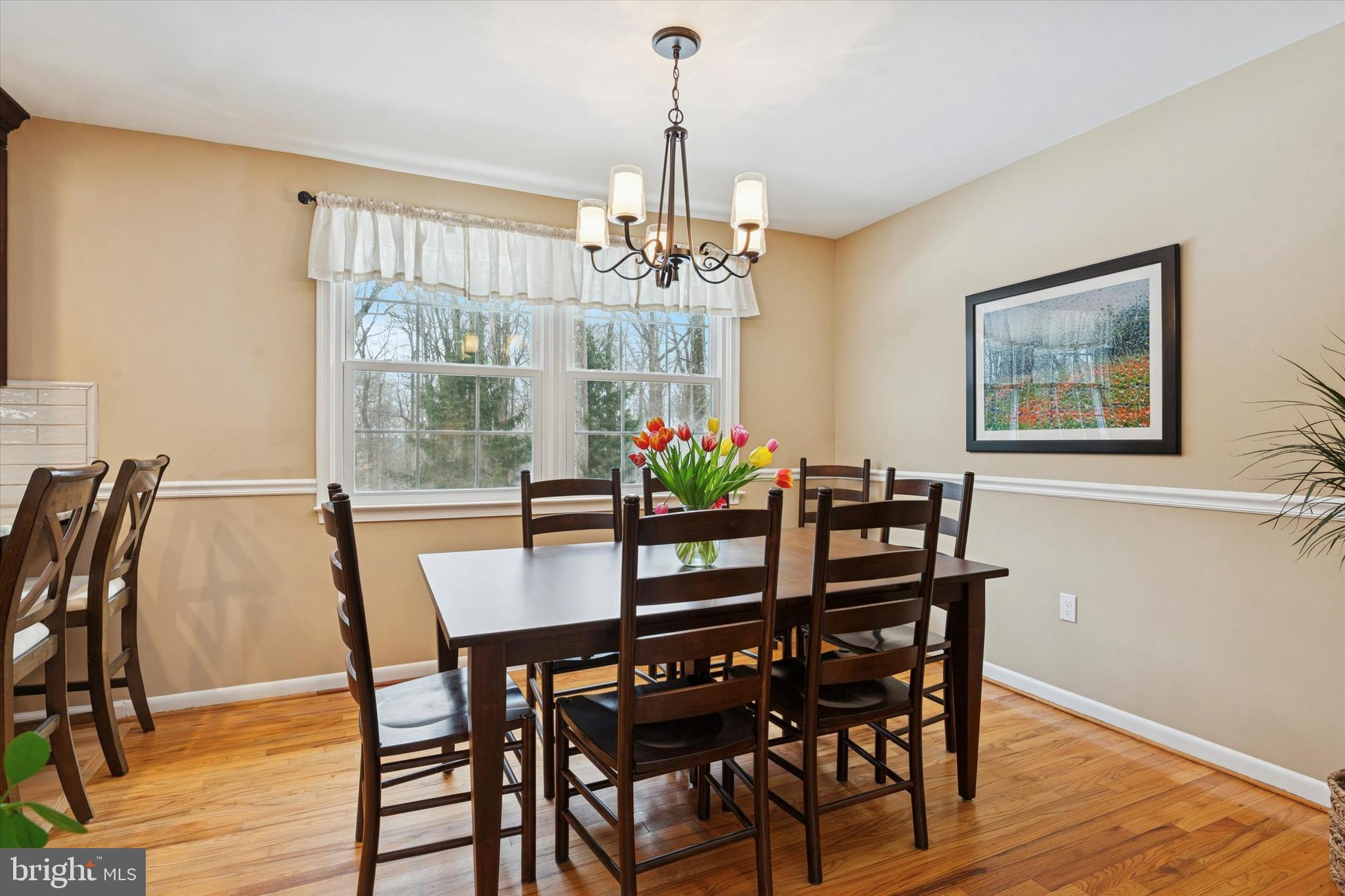 1052 West Valley Hill Road Malvern, PA 19355 - Photo 10 of 25 a view of a dining room with furniture window and wooden floor