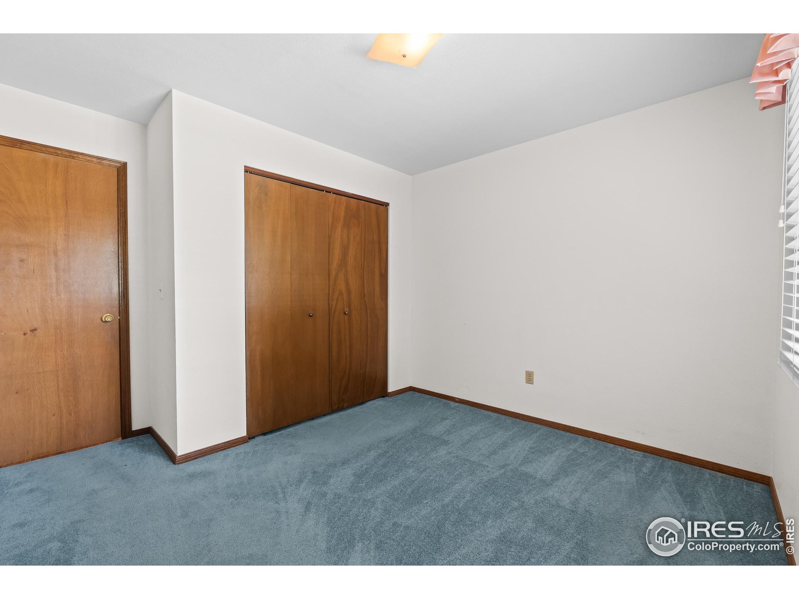 1100 South Taft Avenue, Unit 46 Loveland, CO 80537 - Photo 24 of 31 a view of an empty room