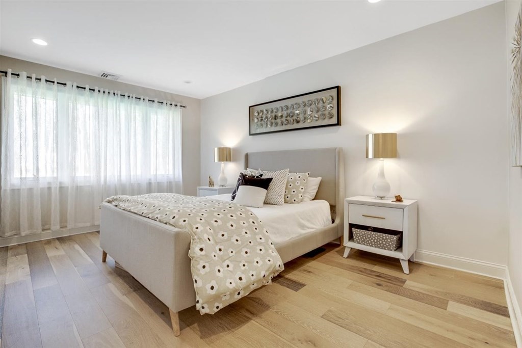 2 West Knoll Road Andover, MA 01810 - Photo 23 of 29 a bedroom with a bed and a window