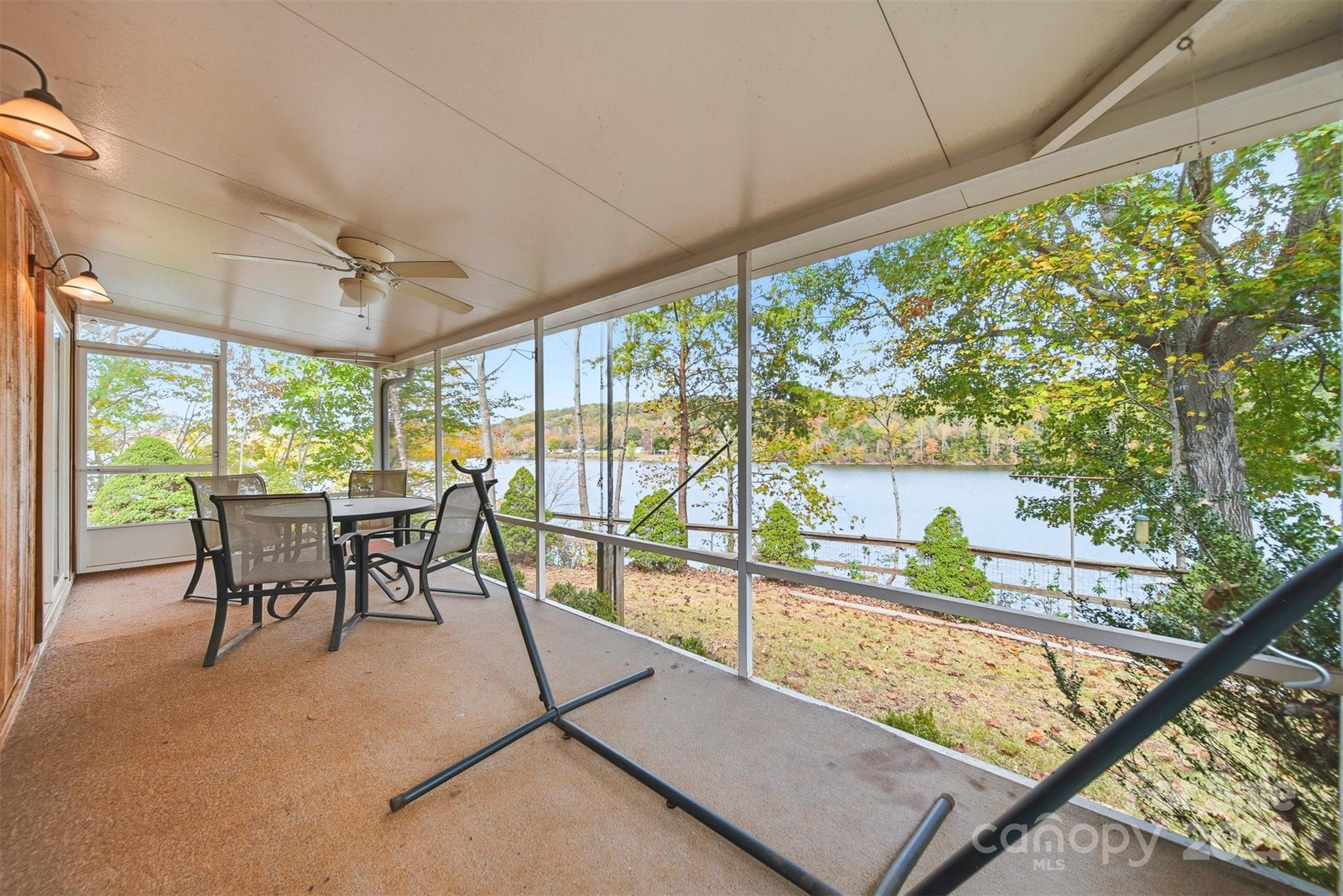 4247 Laurel Hill Road Claremont, NC 28610 - Photo 13 of 34 a view of a dining room with furniture window and outside view