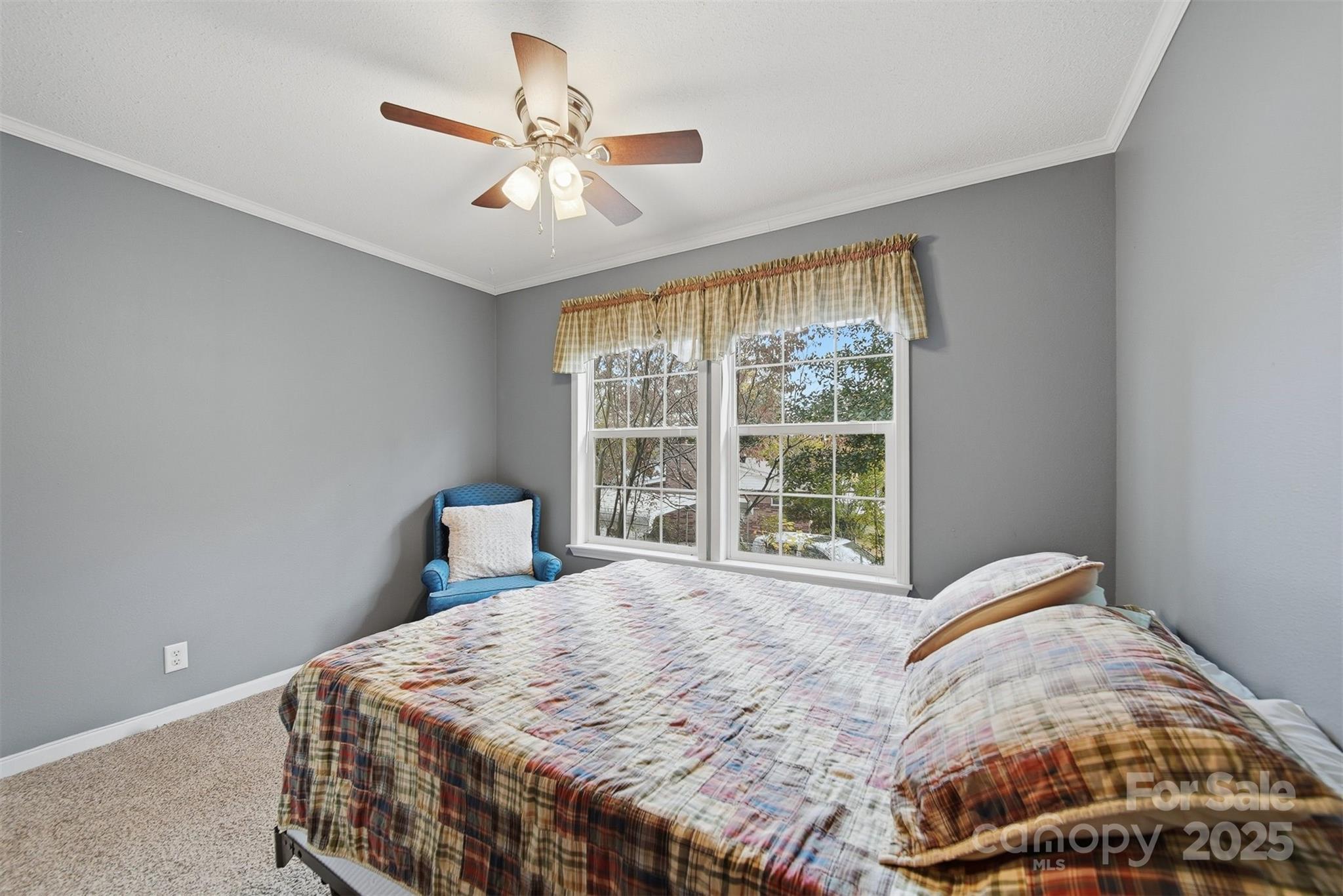 4247 Laurel Hill Road Claremont, NC 28610 - Photo 18 of 34 a bedroom with a bed and window