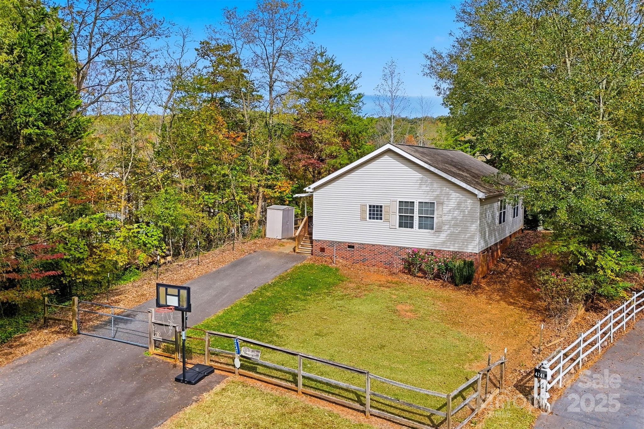 4247 Laurel Hill Road Claremont, NC 28610 - Photo 29 of 34 a view of backyard with a garden