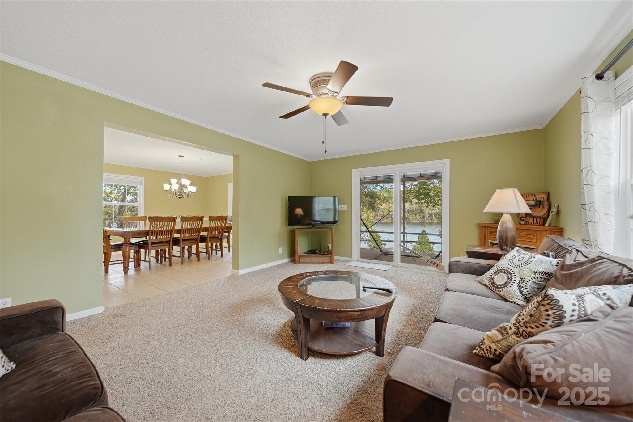 4247 Laurel Hill Road Claremont, NC 28610 - Photo 7 of 34 a living room with furniture and a large window