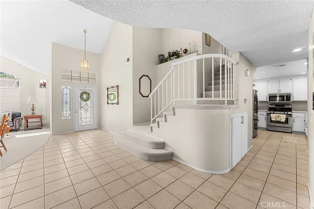 a view of a kitchen with windows