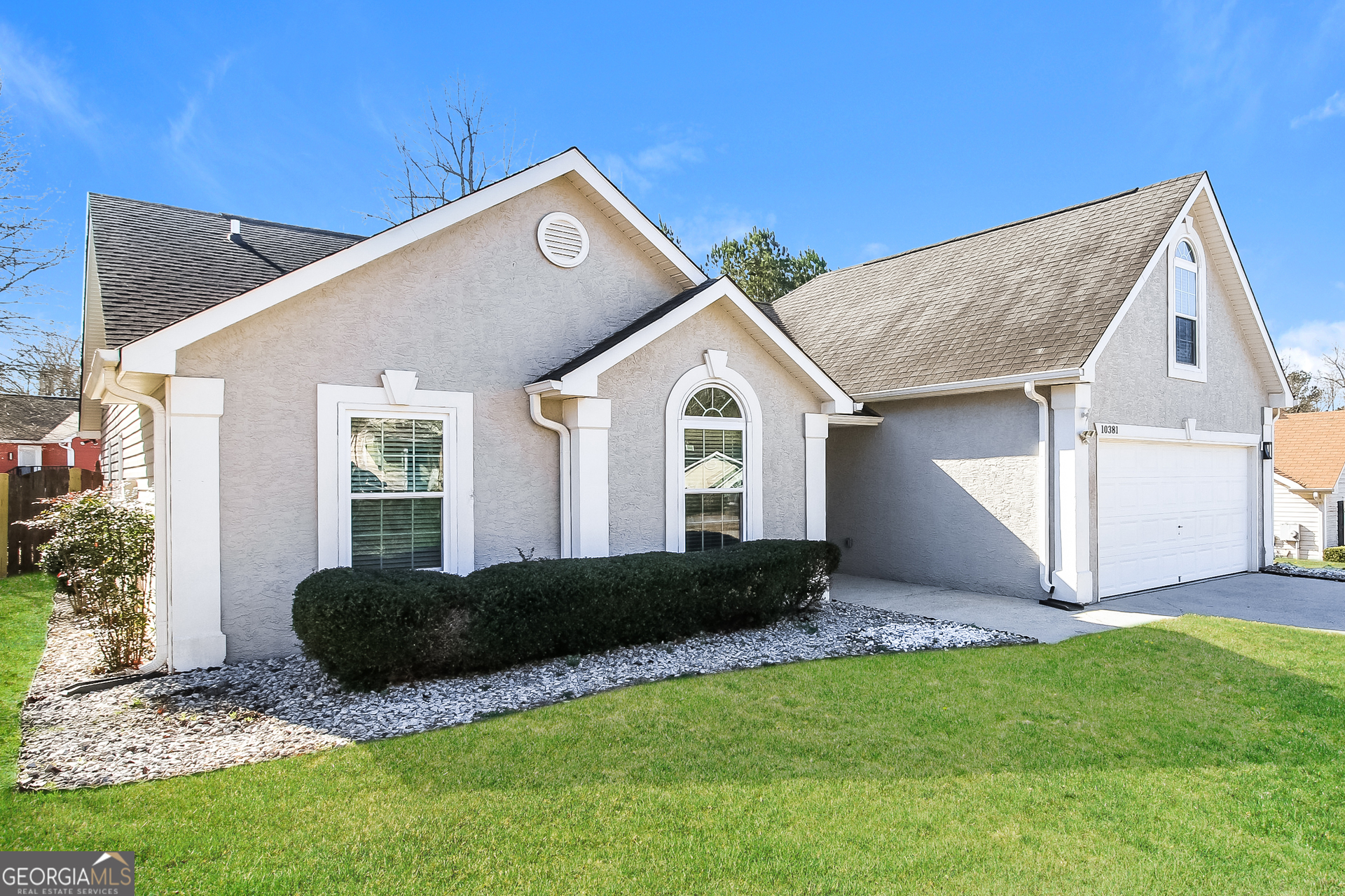 10381 Commons Crossing Jonesboro, GA 30238 - Photo 2 of 17 a view of outdoor space and yard with green space