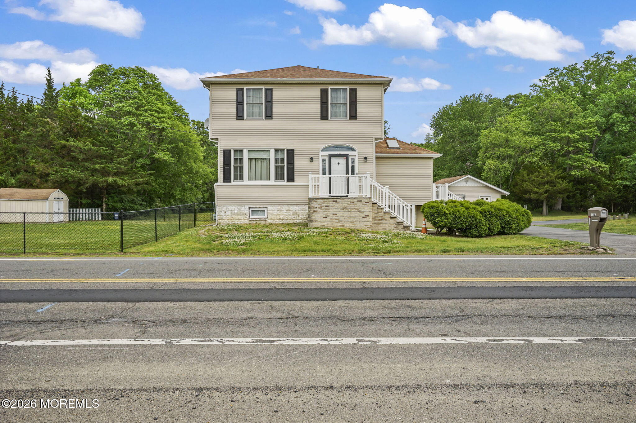 438 Bennetts Mills Road Jackson, NJ 08527 - Photo 2 of 42 a view of a house with a yard and plants