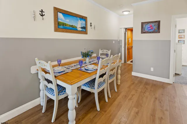 a view of a chair and tables in the balcony