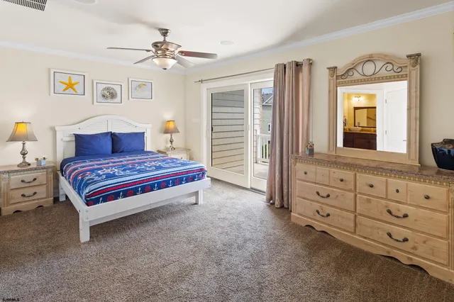 a spacious bathroom with a granite countertop sink toilet mirror and a bathtub