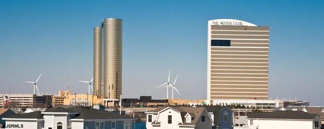 a view of a house with a small yard