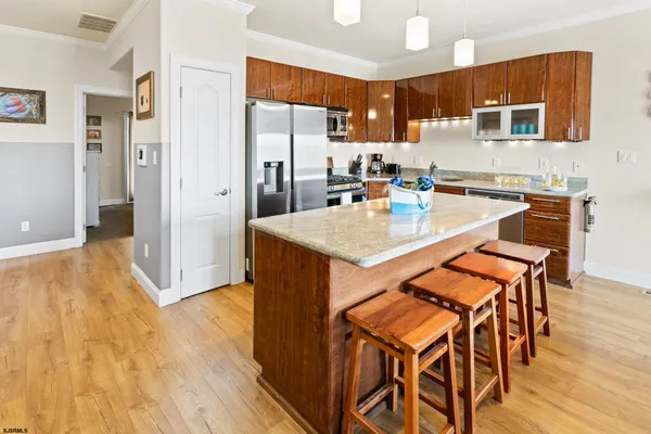 a view of a house with a potted plant