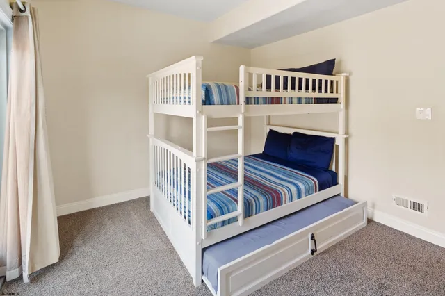 a picture of a bench in a room