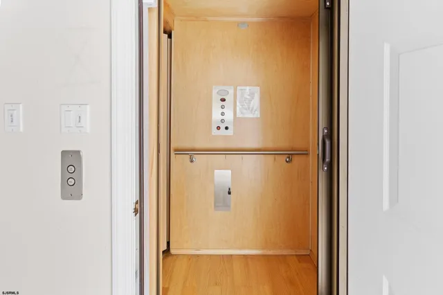 an aerial view of a house with a lake view