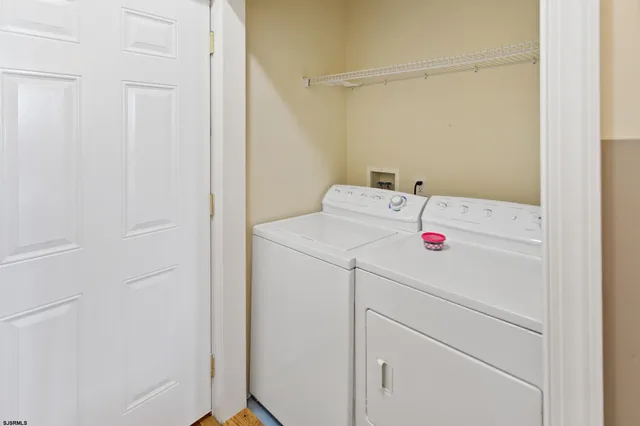 a view of a swimming pool with a lounge chairs