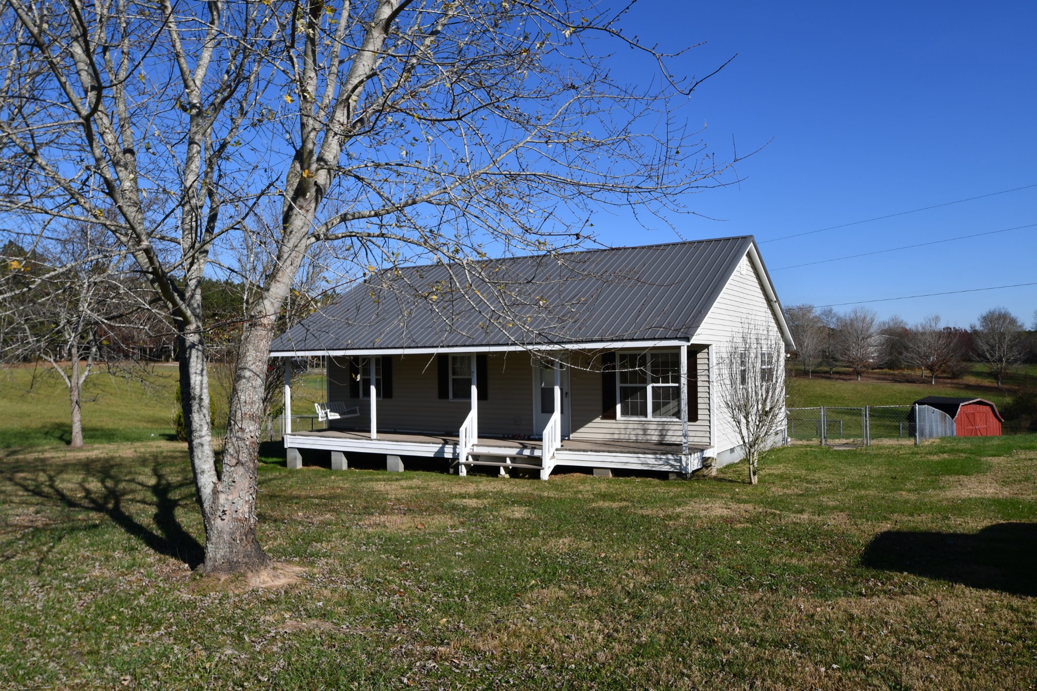 7 Fleeman Road Lawrenceburg, TN 38464 - Photo 1 of 16 front view of a house with a yard
