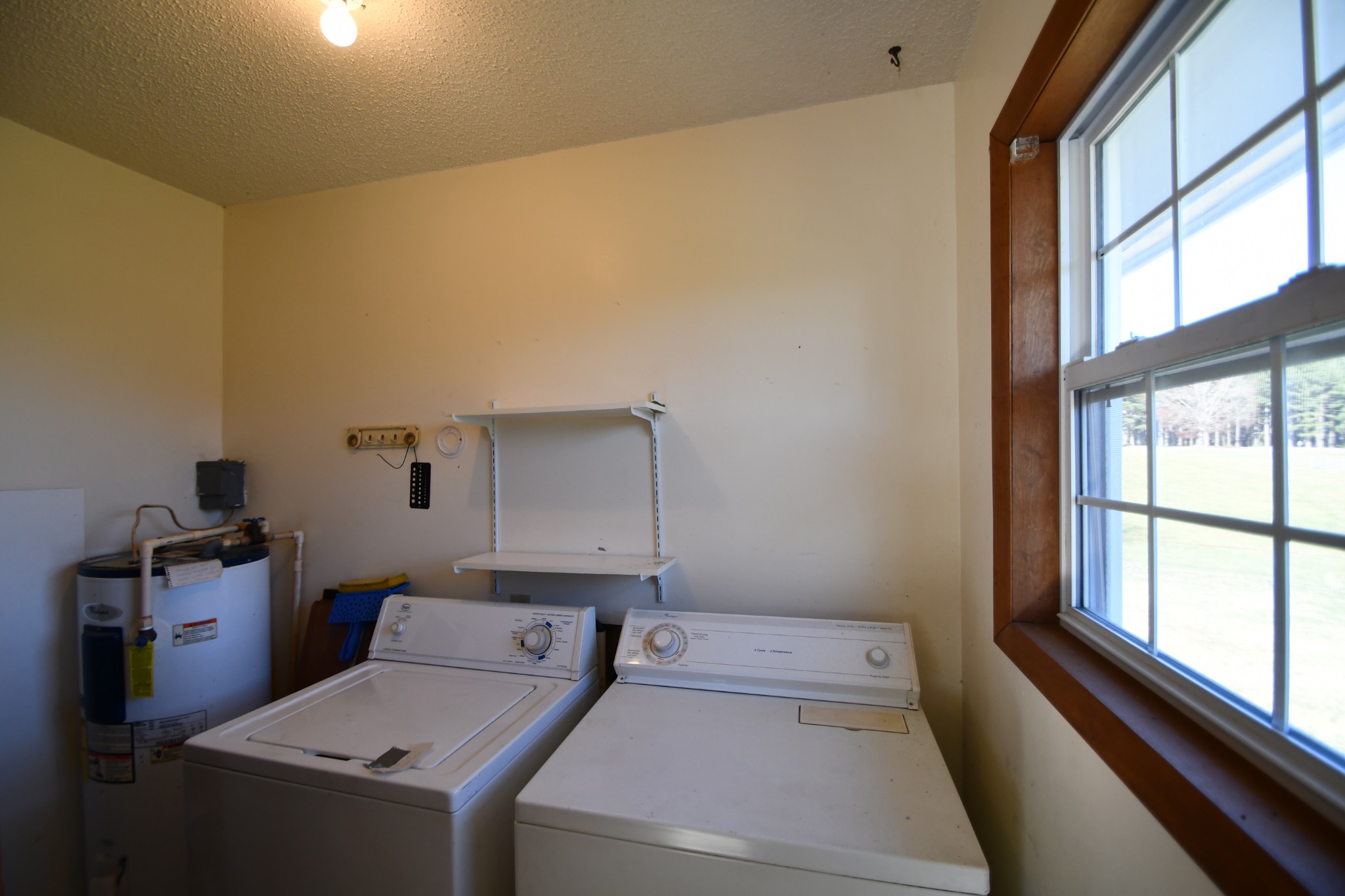7 Fleeman Road Lawrenceburg, TN 38464 - Photo 12 of 16 a view of storage and utility room with washer and dryer