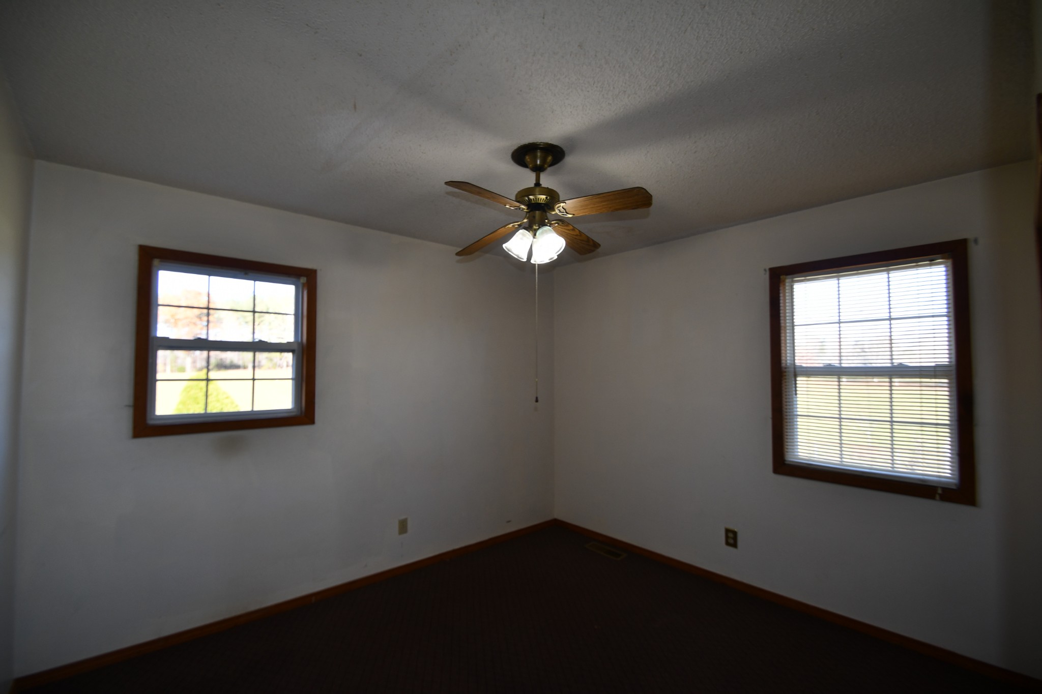 7 Fleeman Road Lawrenceburg, TN 38464 - Photo 14 of 16 wooden floor in an empty room with a window