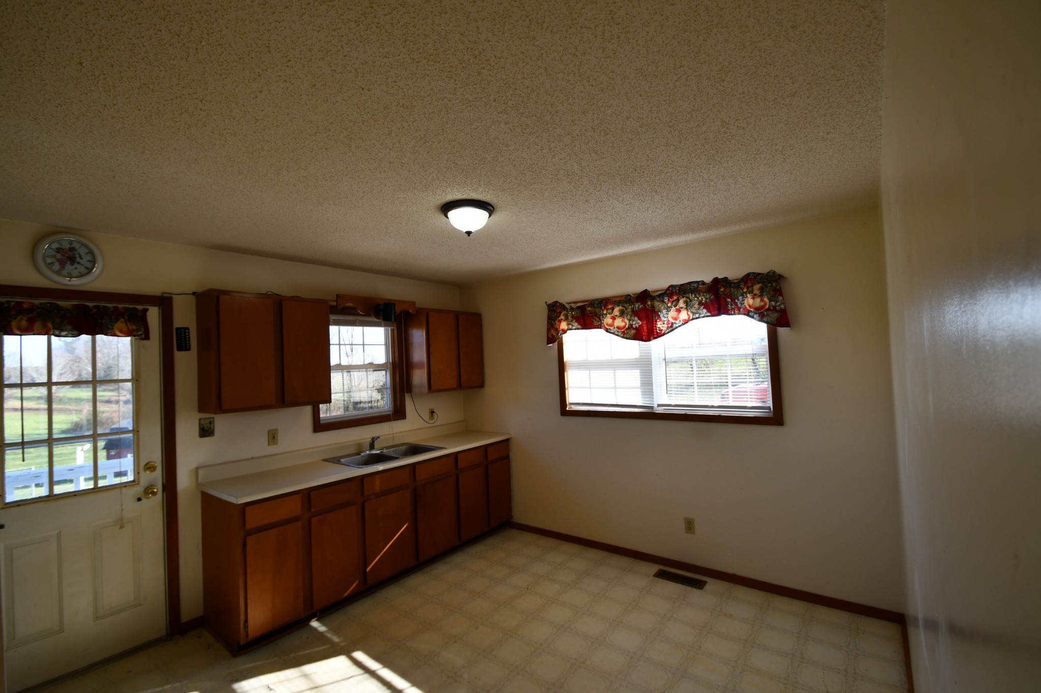 7 Fleeman Road Lawrenceburg, TN 38464 - Photo 9 of 16 an empty room with window and cabinet