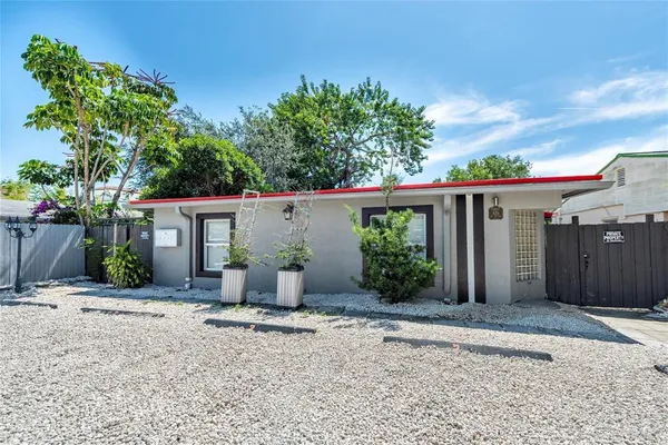 front view of a house with a patio