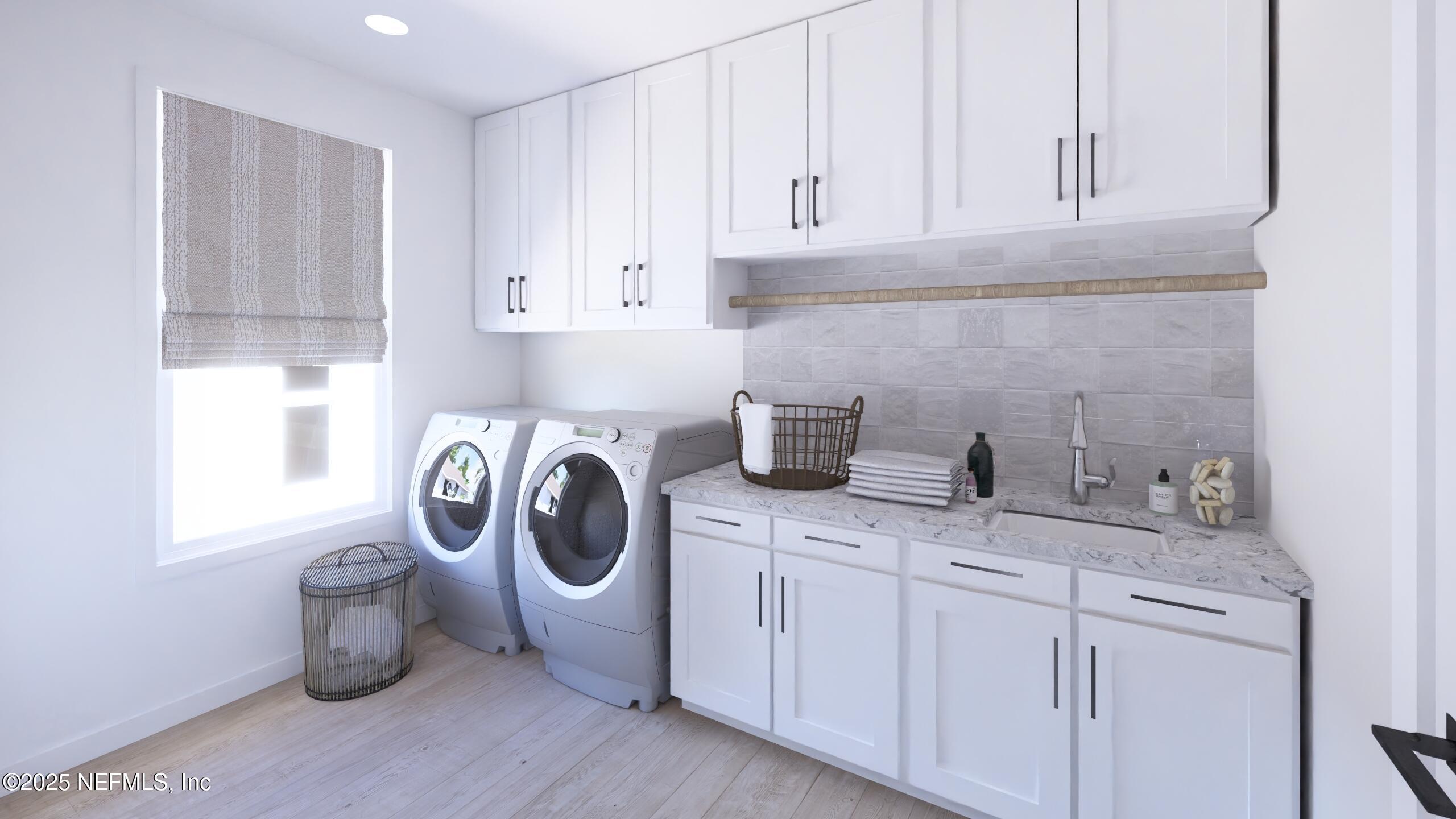 2016 Beach Avenue Atlantic Beach, FL 32233 - Photo 13 of 18 a utility room with sink dryer and washer