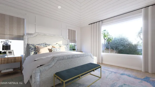 a bedroom with a bed and windows