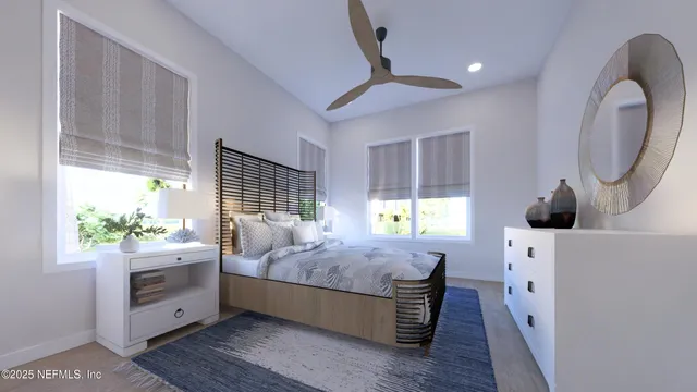 a bed room with a bed and a window