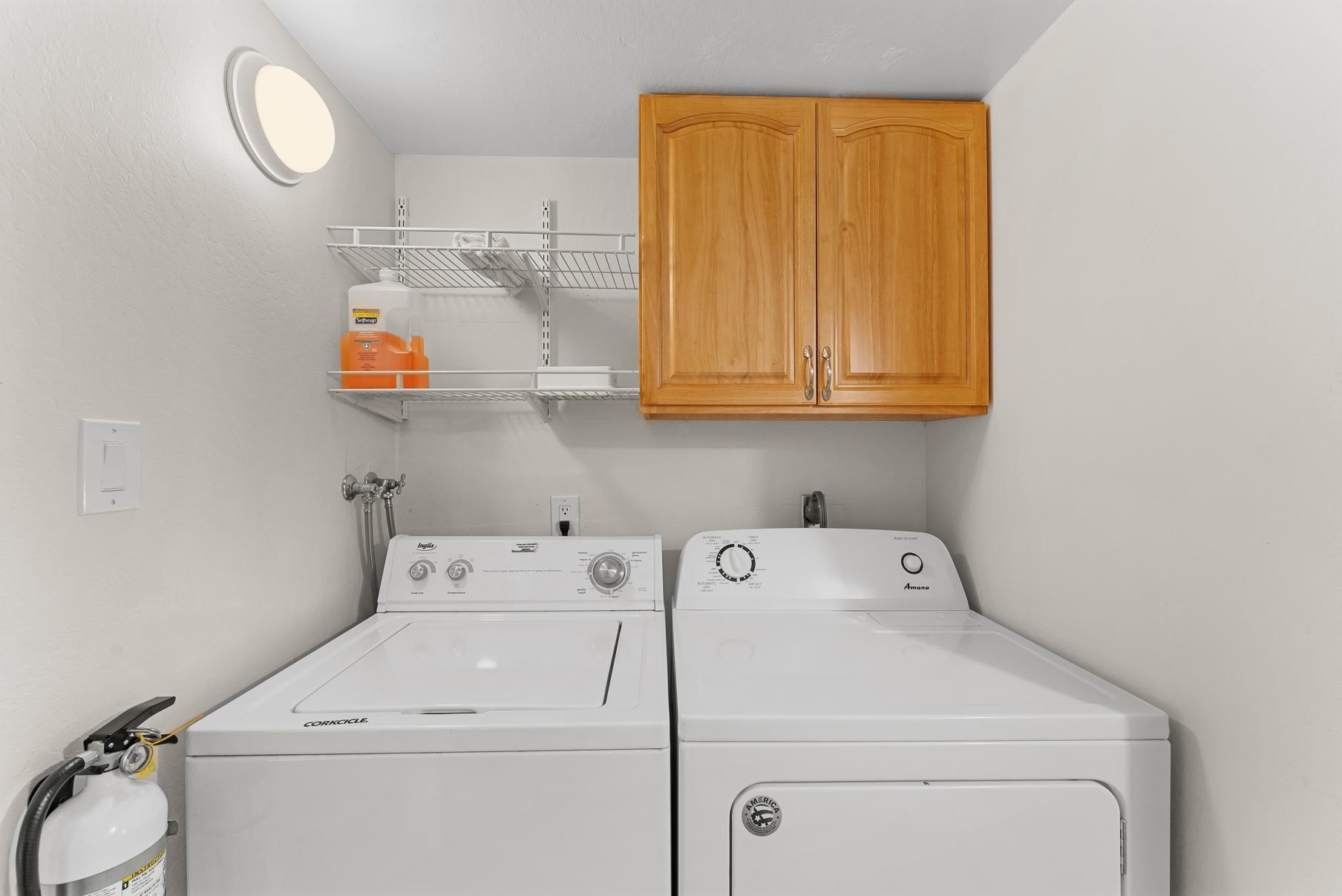 1001 Commonwealth Drive, Unit 101 Kings Beach, CA 96143 - Photo 18 of 28 a utility room with dryer and washer