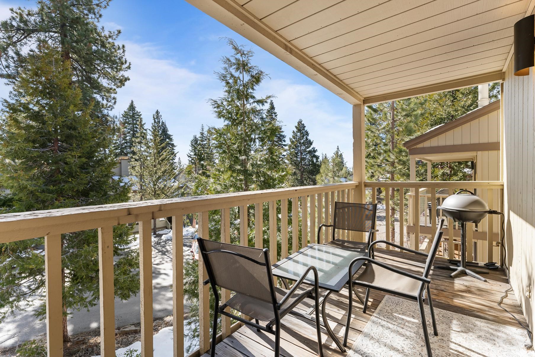 1001 Commonwealth Drive, Unit 101 Kings Beach, CA 96143 - Photo 19 of 28 a view of a chairs and table in the balcony