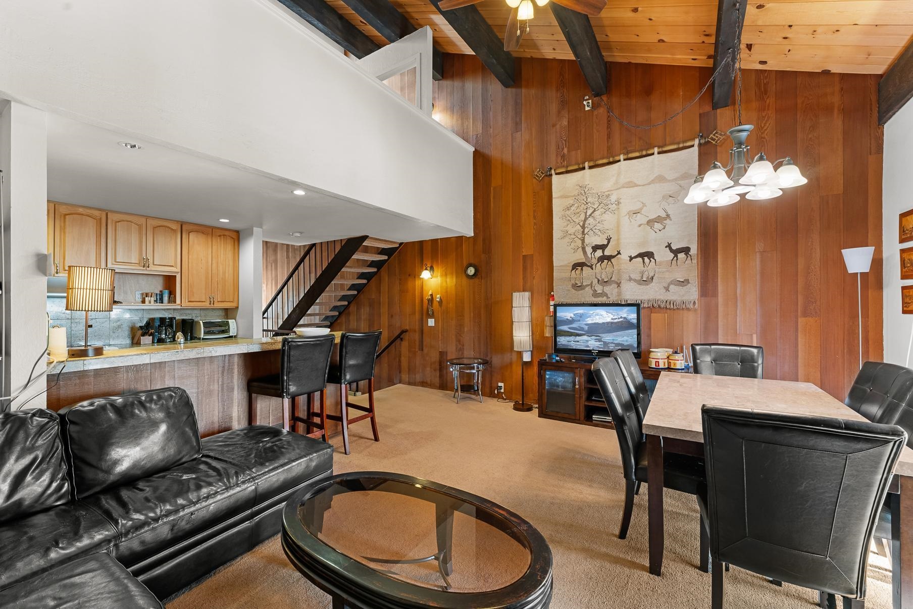 1001 Commonwealth Drive, Unit 101 Kings Beach, CA 96143 - Photo 4 of 28 a dining room with furniture and wooden floor