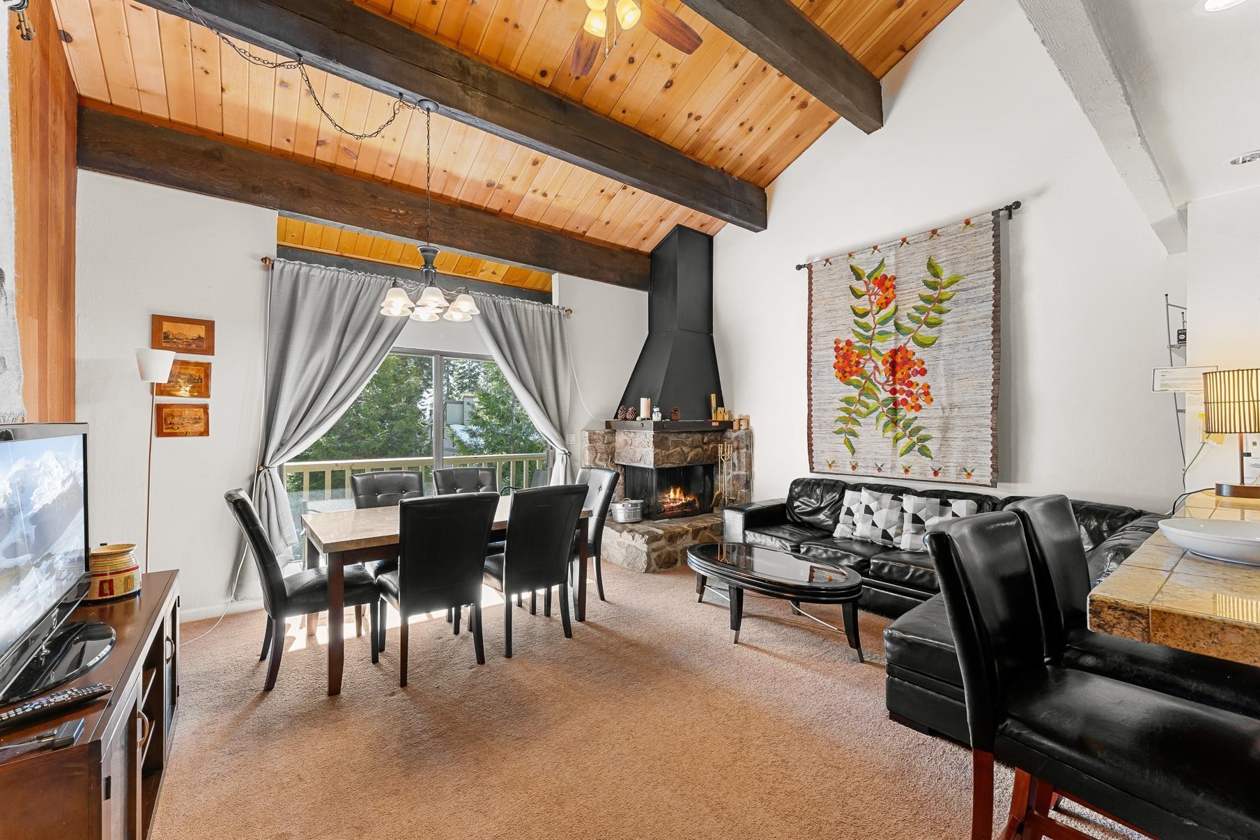 1001 Commonwealth Drive, Unit 101 Kings Beach, CA 96143 - Photo 5 of 28 a view of a dining room with furniture window and outside view