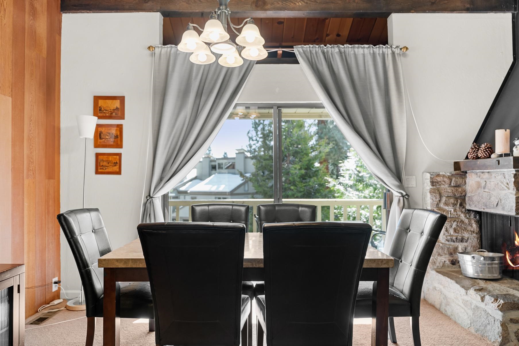 1001 Commonwealth Drive, Unit 101 Kings Beach, CA 96143 - Photo 6 of 28 a view of a dining room with furniture window and outside view