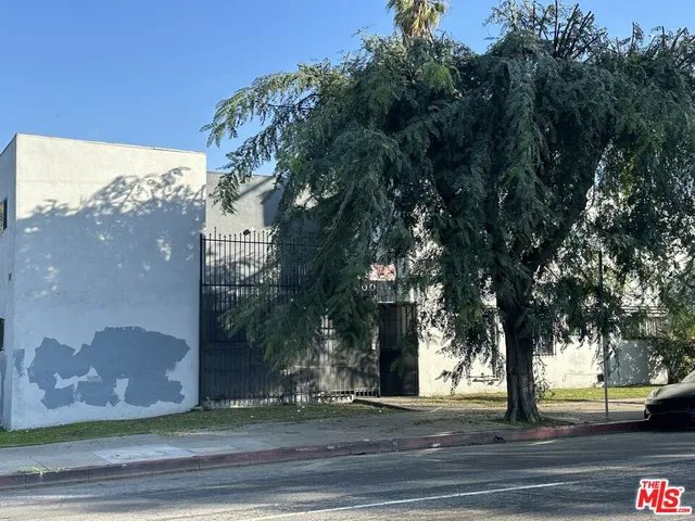 a view of a street with houses
