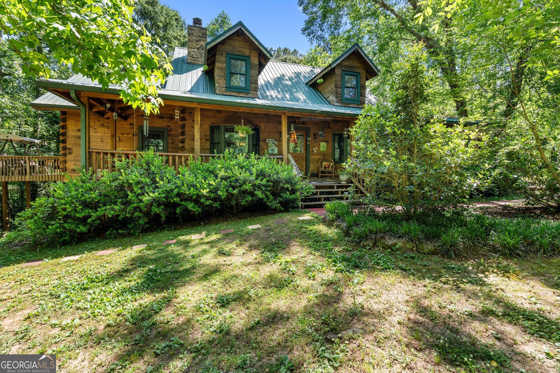4930 Post Road Winston, GA 30187 - Photo 1 of 59 a front view of a house with garden