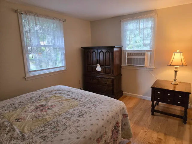 a bedroom with a bed and a closet
